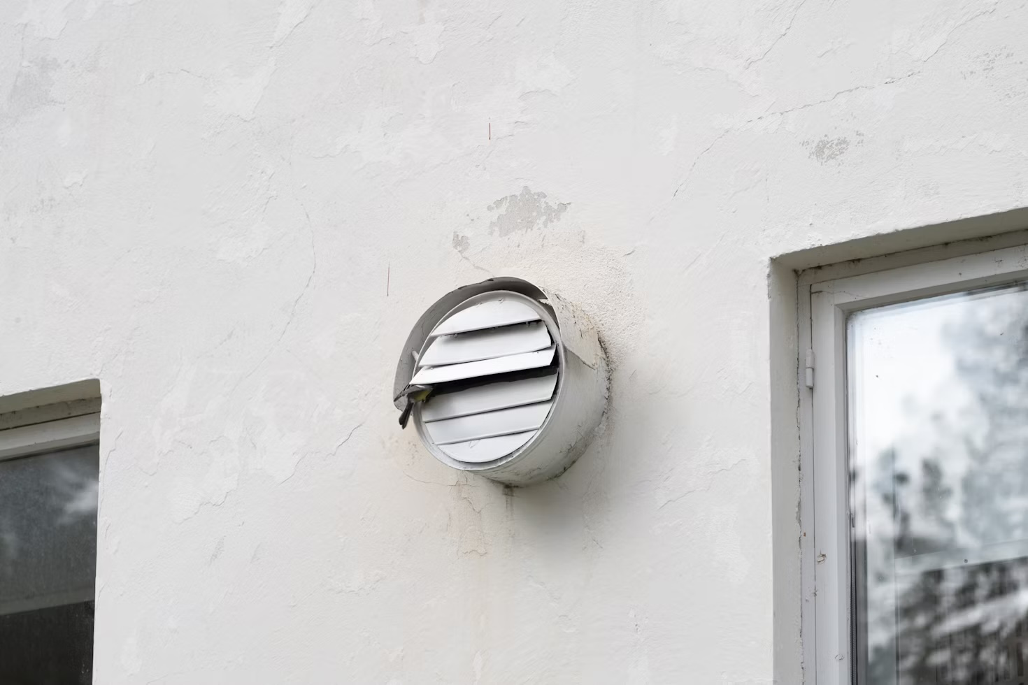 Dryer vent on the outside of a building